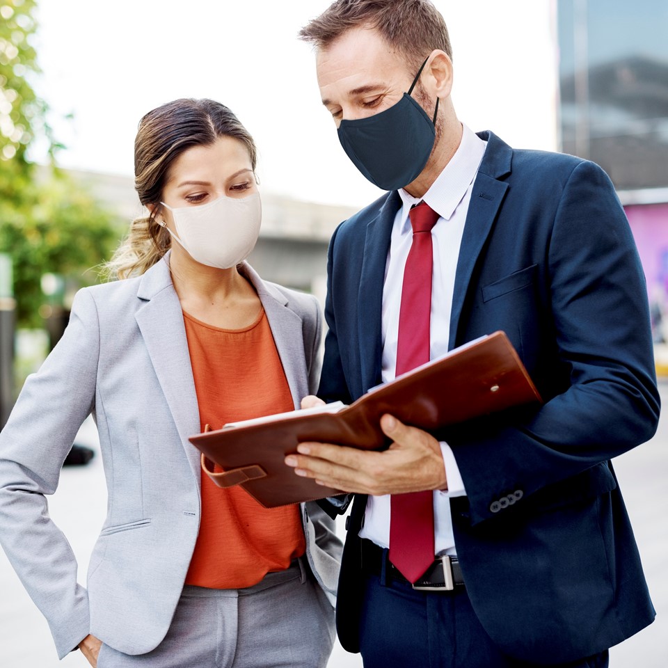 business-people-in-face-mask-working-in-new-normal